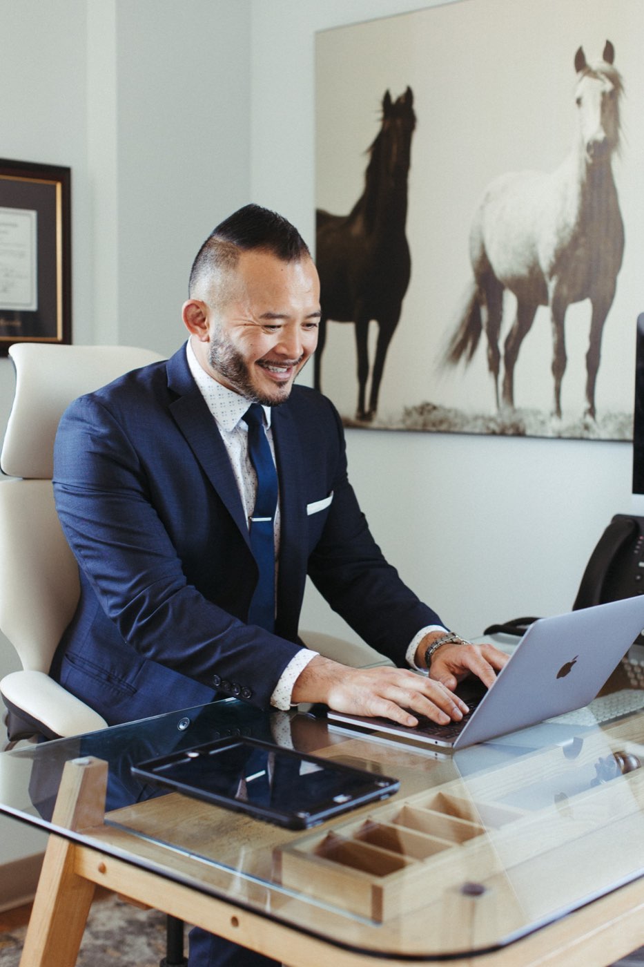 Dr. Peter Le at his desk